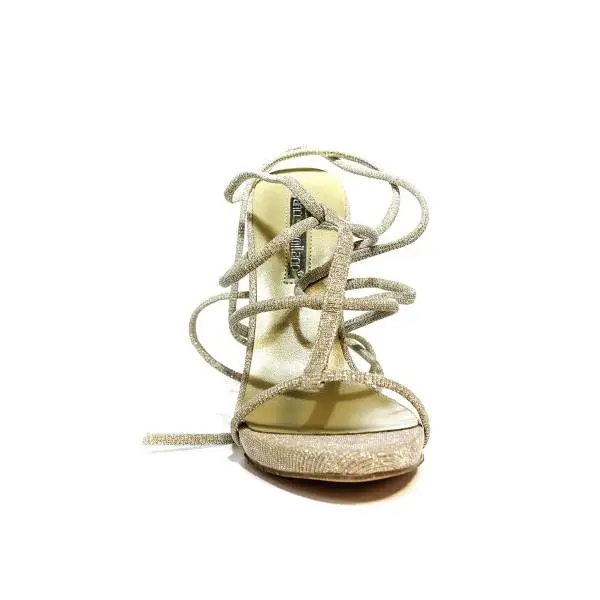 Francesco Milano sandal with slave laces and high heel in platinum color article N16-3G-PLY