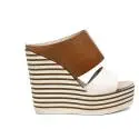 Zoe Italy women sandal with high wedge white and leather color article MIC100/02