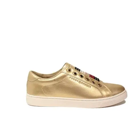 Tommy Hilfiger sneakers with low wedge gold color article FW0FW01913/058